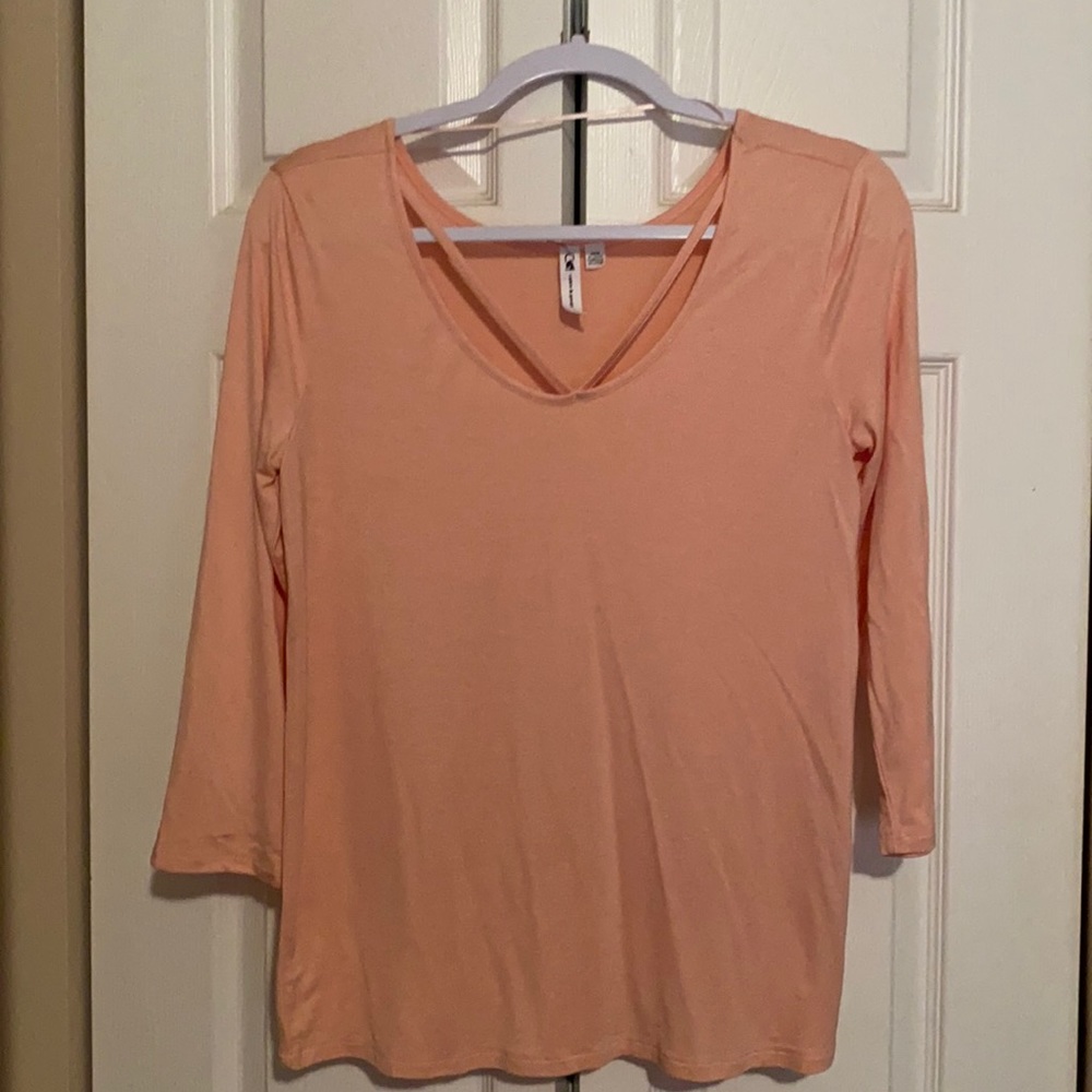 Peach top, with fun V neck